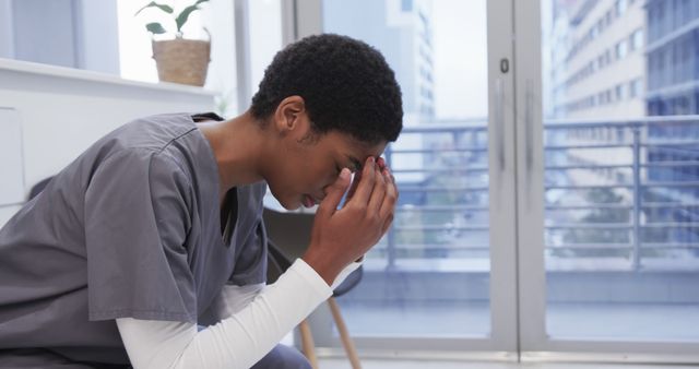 This image can be used to address themes of healthcare workers' mental health and stress during work. It is suitable for articles, blogs, and campaigns focused on burnout, healthcare challenges, and workplace stress in medical professions.