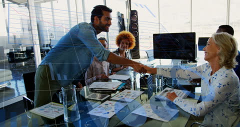 Diverse Business Team Analyzing Financial Data with Virtual Graphs