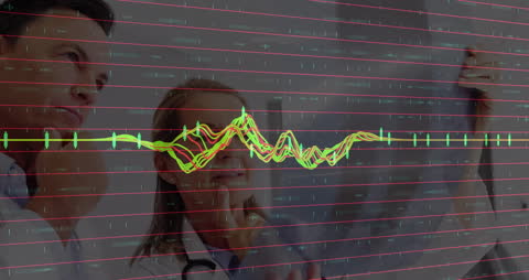 Business Team Analyzing Financial Data Graphs in Office