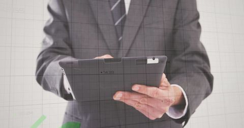 Business Professional Analyzing Financial Growth on Tablet - Download Free Stock Images Pikwizard.com