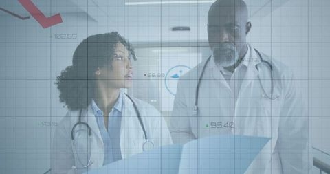 Medical Professionals Analyzing Data with Advanced Technology in Hospital