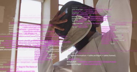 Indian fencer lifting mask with gloved hand, code overlays, magenta data, sport training