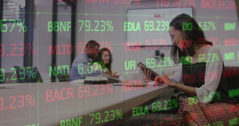 Businesswoman Analyzing Data in Modern Office with Financial Graph Overlay - Download Free Stock Images Pikwizard.com