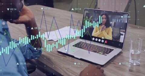 Viewing remote finance meeting with live candlestick charts overlaid on laptop video call