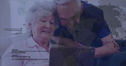 Senior couple sharing tablet with map and code overlay illustrating digital connectivity
