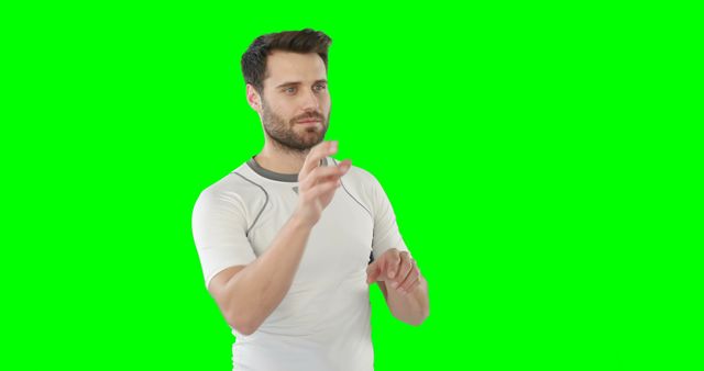 Man in White Shirt Gesturing with Green Screen Background - Download Free Stock Images Pikwizard.com