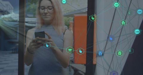 Young woman holding smartphone and interacting with augmented reality shopping network