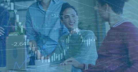 Business team analyzing market trends in office setting