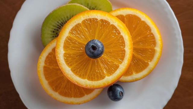 Fresh Fruit Arrangement on Rustic White Plate