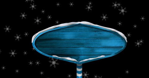 Blue Wooden Sign with Copy Space and Falling Snowflakes