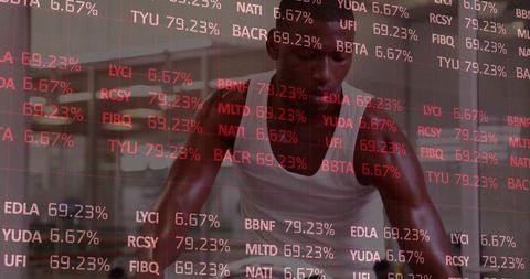 Leaning muscular man resting after intense workout with red stock ticker overlay