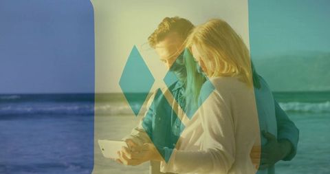 Romantic Couple on Shoreline Reviewing Smartphone with Arctic Overlay