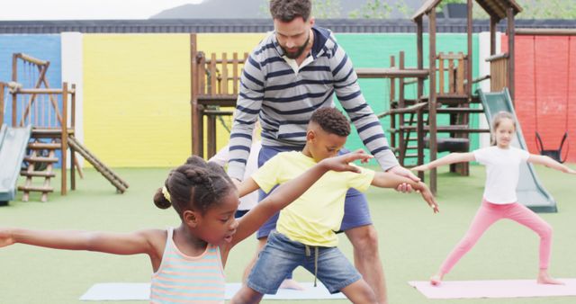 Children and Teacher Doing Yoga Outdoors in Playground - Download Free Stock Images Pikwizard.com