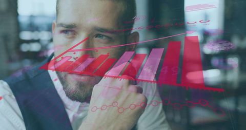 Businessman analyzing digital financial graph