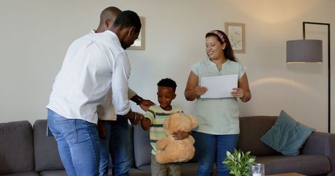 Diverse Family Weekend Bonding with Technology and Entertainment