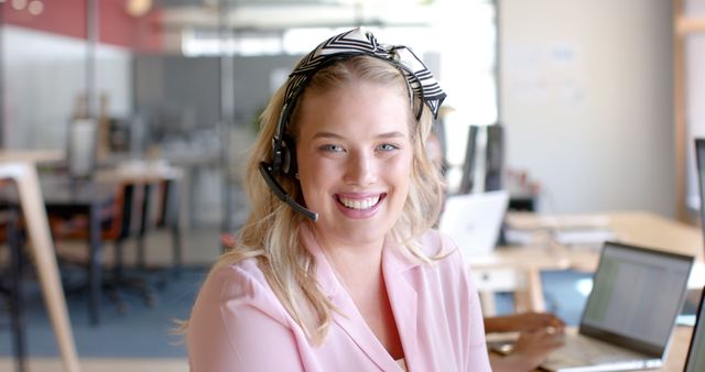 Smiling Customer Support Representative in Office Environment - Download Free Stock Images Pikwizard.com