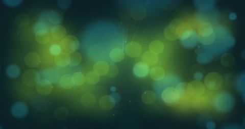 Abstract Glowing Green Bokeh Lights on Dark Background
