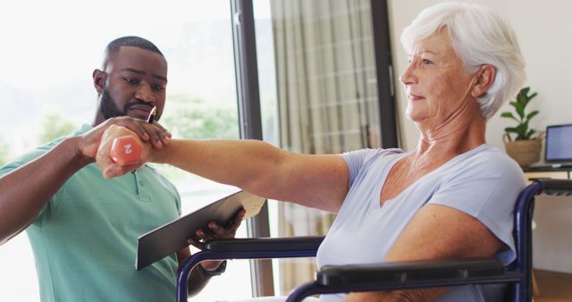 Elderly woman participating in physical therapy sessions, receiving guidance from a therapist who assists her with exercises. Image highlights concepts of senior care, rehabilitation, and physical health. Useful for articles about aging, senior wellness programs, healthcare services, and physical rehabilitation.