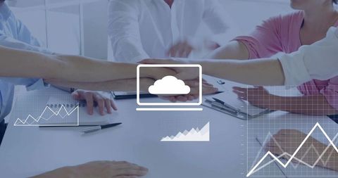 Hands Joining in Team Huddle Over Desk with Cloud Computing Overlays and Analytics
