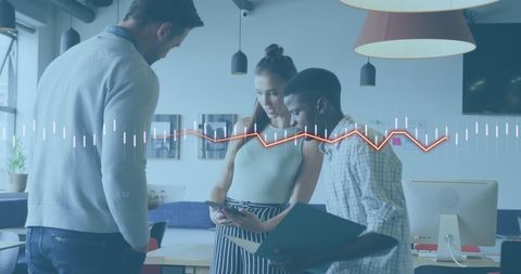 Diverse Business Team Analyzing Financial Data with Transparent Charts
