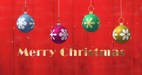 Festive Christmas Greeting with Hanging Baubles on Red Background