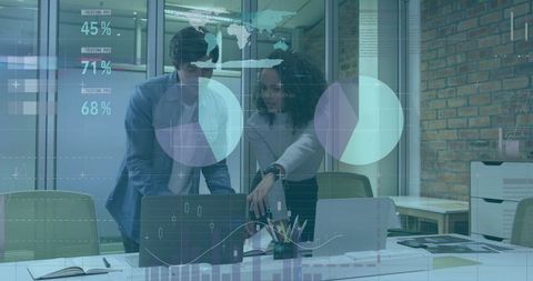 Business Professionals Analyzing Data with Graphics Overlay in Modern Office