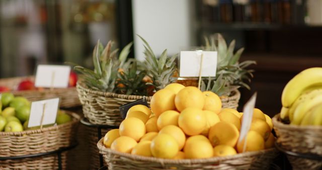 Fresh Lemons and Pineapples in Baskets at Market - Download Free Stock Images Pikwizard.com