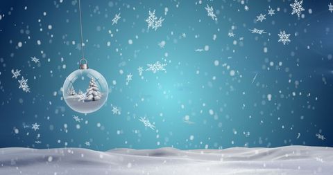 Christmas Bauble Hanging in Snowy Winter Wonderland