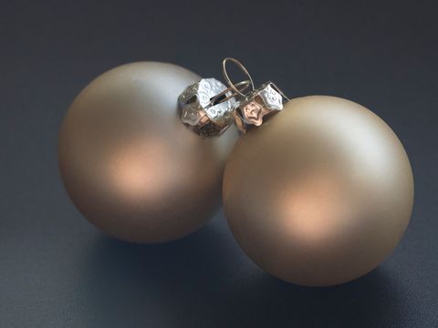 Pair of Elegant Metallic Christmas Baubles on Dark Surface