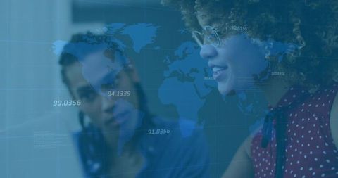 Colleagues Collaborating with Technology and World Map Hologram