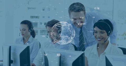 Multicultural call center team collaborating with supervisor around holographic data globe