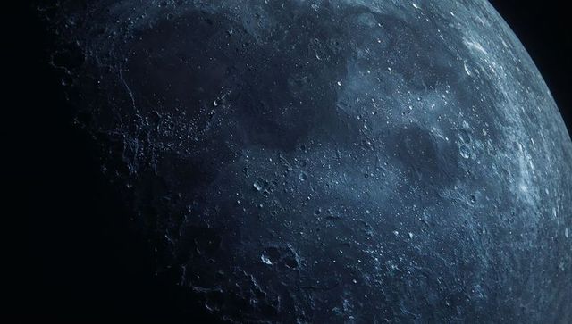 Partial lunar surface with craters and highlands in outer space