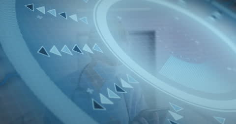 Doctor Using Tablet Technology in Hospital Environment