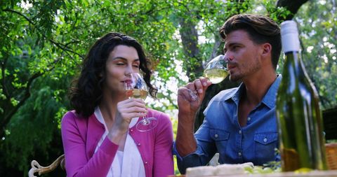 Couple Enjoying Wine Tasting in Outdoor Nature Setting - Download Free Stock Images Pikwizard.com