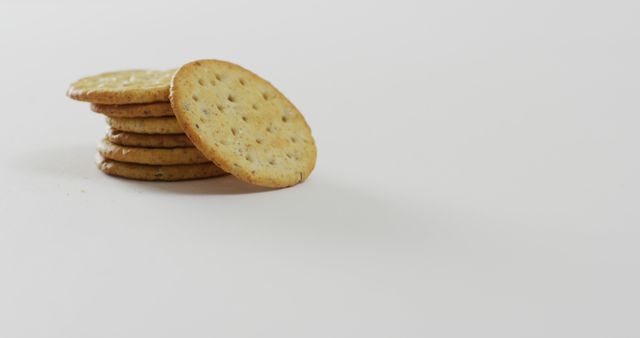 Stack of whole wheat crackers on white background - Download Free Stock Images Pikwizard.com