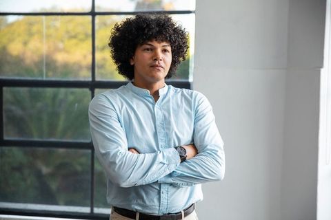 Confident Young Professional in Bright Office Space