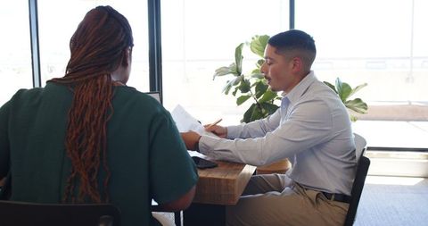 Collaborative Discussion in Modern Office Setting