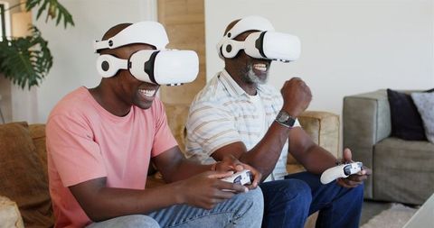 Father and Son Bonding While Playing Virtual Reality Games Together