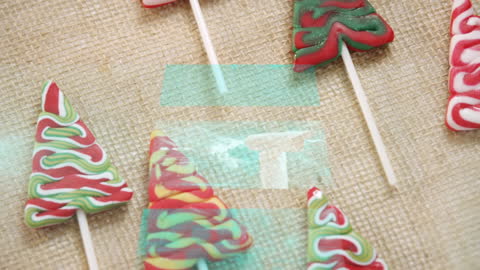 Christmas Tree Lollipops on Burlap Background with Animated Lighting