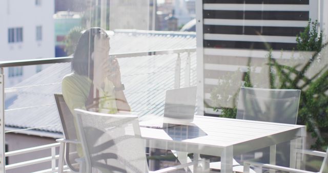 Woman Working from Outdoor Office Balcony with Laptop - Download Free Stock Images Pikwizard.com