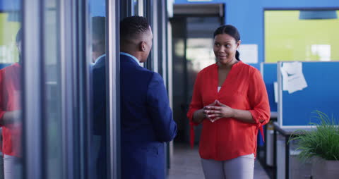 Professional Colleagues Engaged in Office Discussion