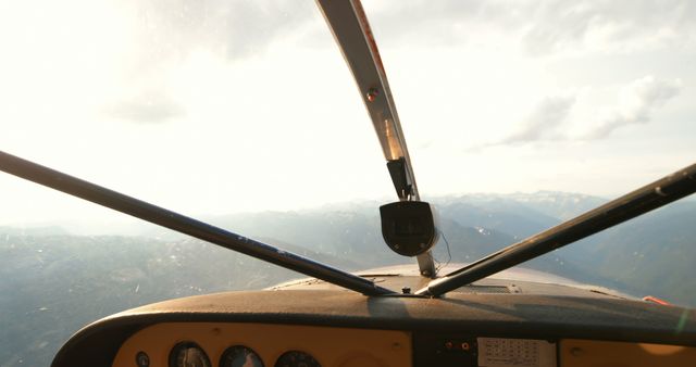 Private aircraft flying over the mountain 4k