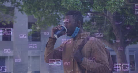 Young Man Experiencing City Life with 5G Technology