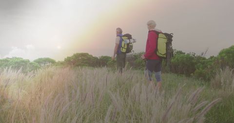 Senior Couple Hiking at Sunset in Countryside - Download Free Stock Images Pikwizard.com