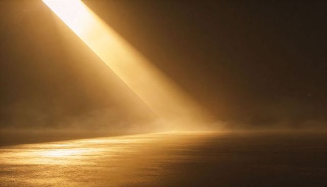 Cutting golden shaft of light carving cinematic mist and reflective floor with haze