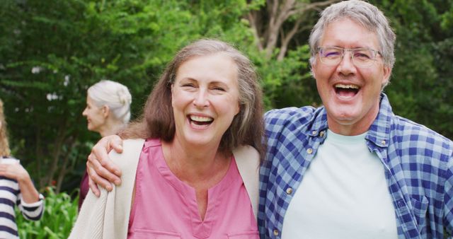 Image of happy caucasian female and male senior friends embracing in garden - Download Free Stock Photos Pikwizard.com