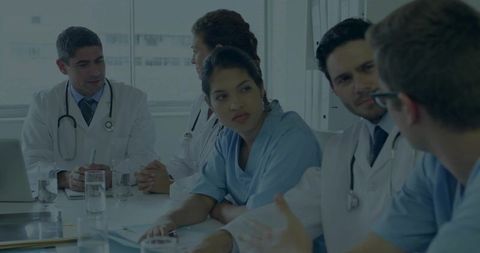 Healthcare professionals collaborating at meeting