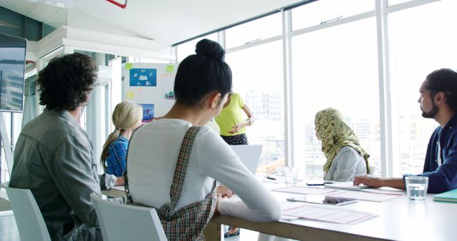 Diverse Business Team Having Meeting in Modern Office with Large Windows - Download Free Stock Images Pikwizard.com