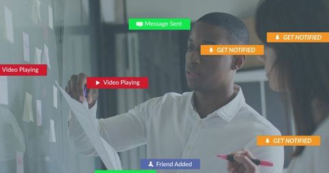 Collaborating team presenting ideas on glass board with digital ui overlays for strategy