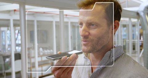 Businessman Using Smartphone for Data Processing with Financial Graphics